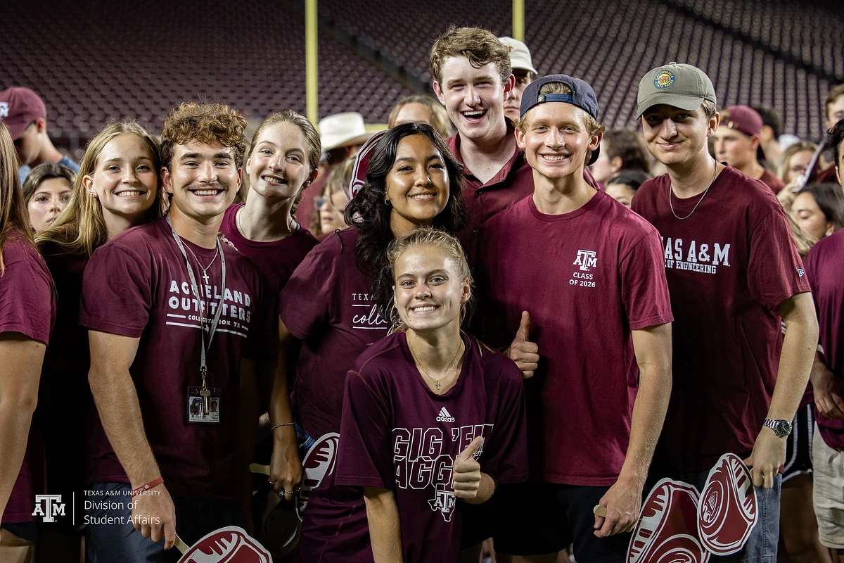 A group of students posing for a picture at the Texas A&M Class of 2026 photo 
