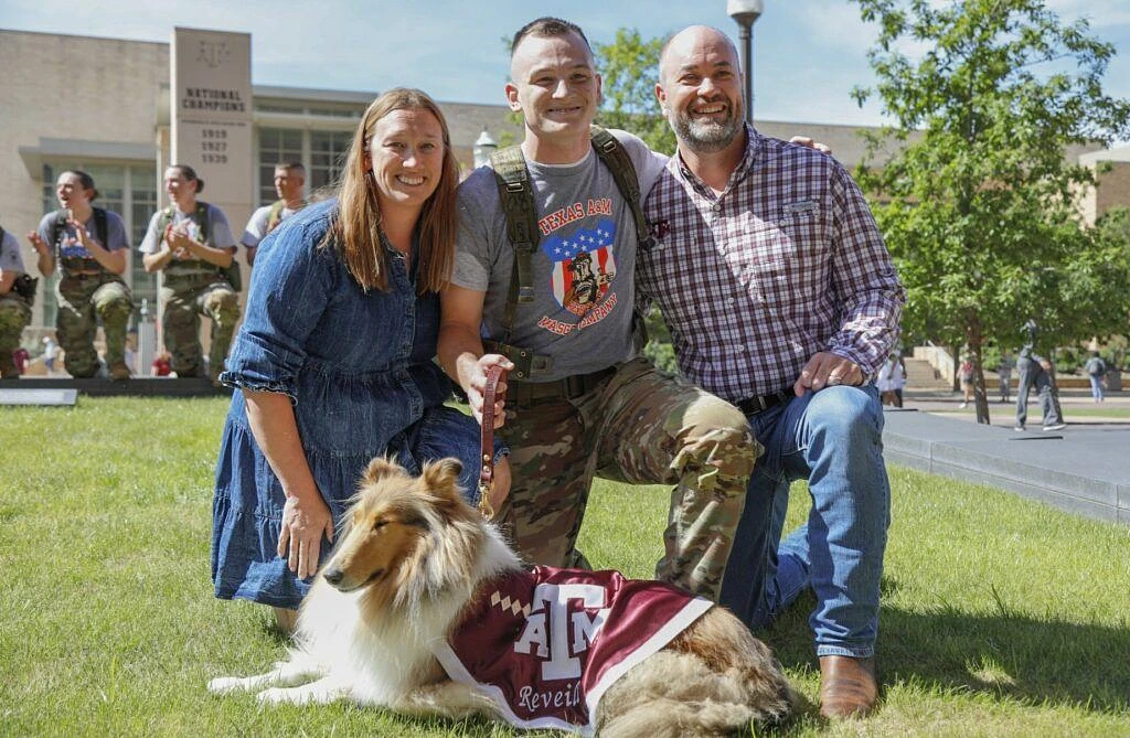Cadet Josh Brewton and his family with Reveille X on the Texas A&M University campus on Friday.